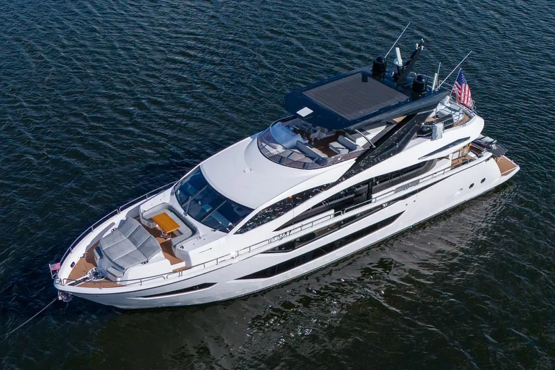 Ramaya 4 Yacht Photos Pics 2023 Sunseeker 88 Yacht cruising on open water, aerial view.