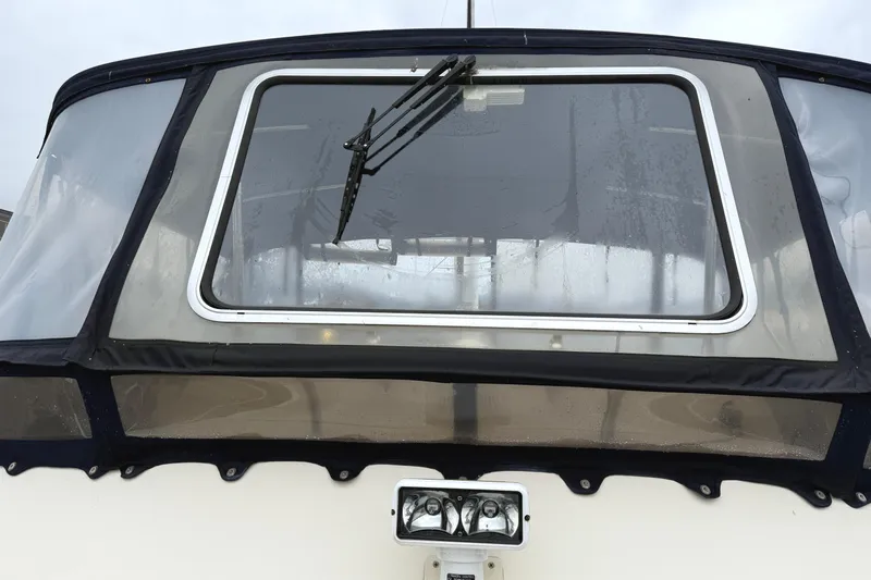 Hula Moon Yacht Photos Pics 2006 Mainship 34 Trawler rear view with window and wiper.