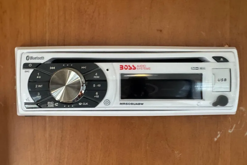 Hula Moon Yacht Photos Pics Boss Audio Systems stereo with Bluetooth and USB on Mainship 34 Trawler, 2006 model.