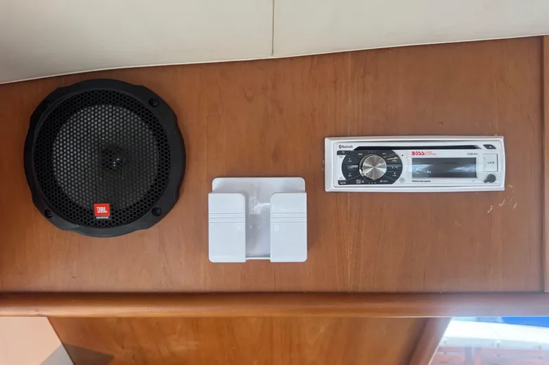 Hula Moon Yacht Photos Pics 2006 Mainship 34 Trawler audio system with JBL speaker and Boss stereo.