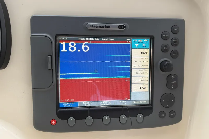 Hula Moon Yacht Photos Pics Raymarine E80 display on 2006 Mainship 34 Trawler showing depth and sea temperature.