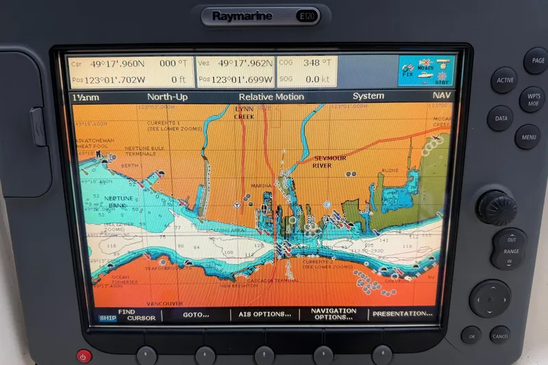Hula Moon Yacht Photos Pics Navigation system display on a 2006 Mainship 34 Trawler, showing a detailed marine chart.