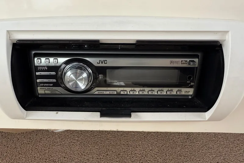 Hula Moon Yacht Photos Pics JVC stereo system in 2006 Mainship 34 Trawler boat dashboard.