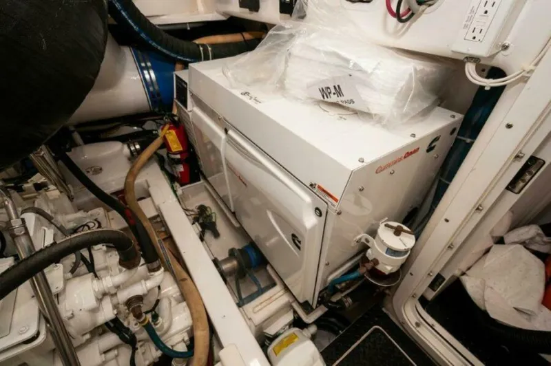 Reel Dangerous Yacht Photos Pics 2012 76 Viking Sky Bridge REEL DANGEROUS Stbd Generator (1)