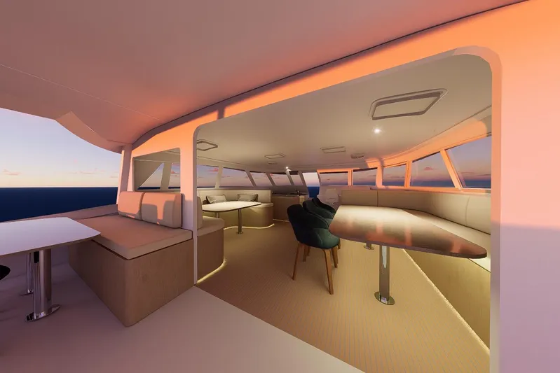  Yacht Photos Pics Luxurious interior of 2026 Rapido 500 ECO ELECTRIC yacht at sunset, featuring elegant seating and tables.