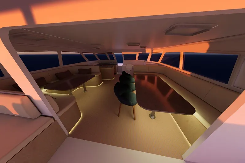  Yacht Photos Pics Luxurious interior of 2026 Rapido 500 ECO ELECTRIC yacht at sunset, featuring elegant seating and tables.