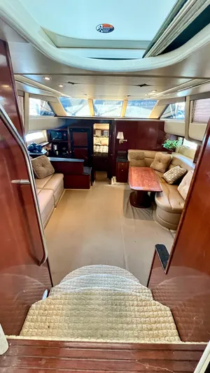  Yacht Photos Pics Interior of 2008 Meridian 459 Motoryacht with luxurious seating and wooden finishes.