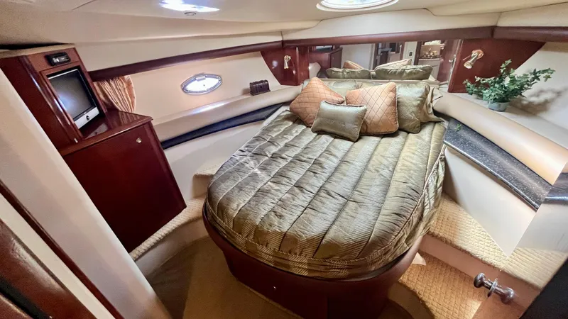  Yacht Photos Pics Luxurious bedroom in 2008 Meridian 459 Motoryacht with cozy bed and elegant decor.
