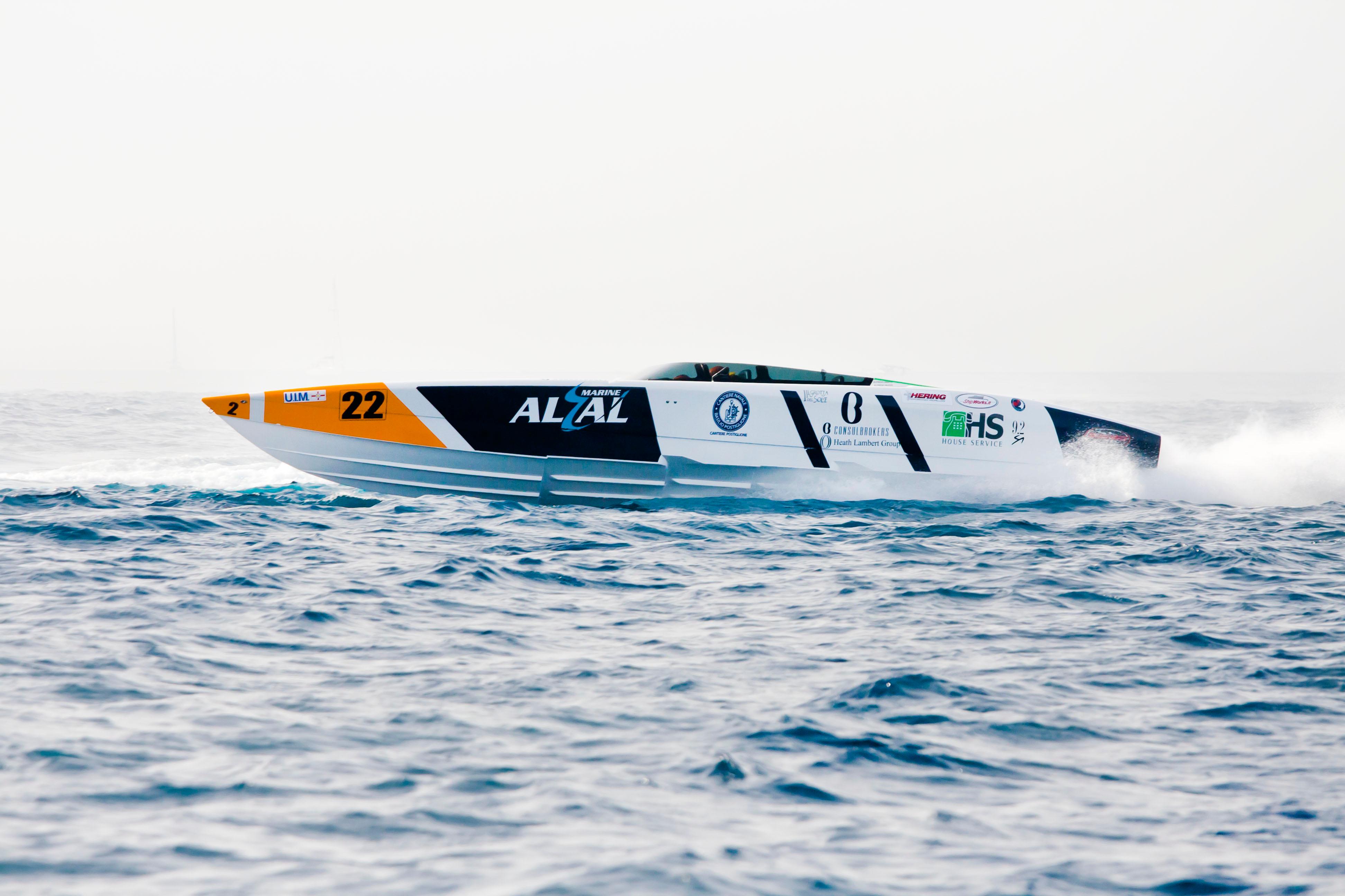 2021 Outerlimits 40 SV powerboat racing on open water, showcasing speed and performance.