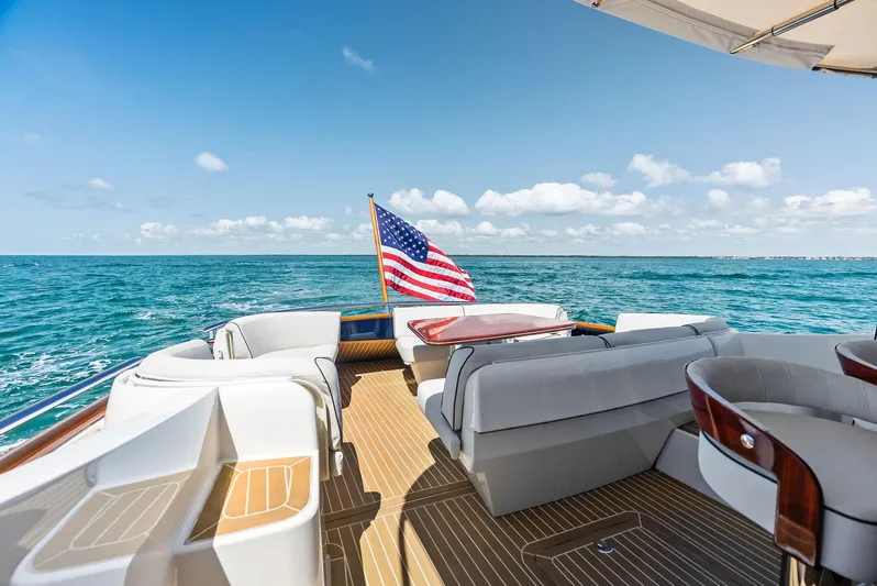 Dutch Yacht Photos Pics Luxurious 2019 Zeelander 55 yacht deck with American flag, cruising on open sea.