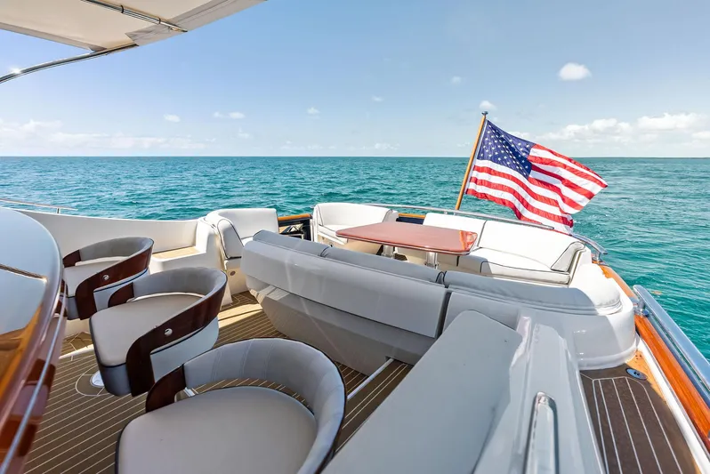 Dutch Yacht Photos Pics Luxurious 2019 Zeelander 55 yacht deck with seating, ocean view, and American flag.