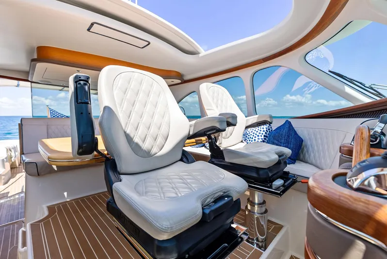 Dutch Yacht Photos Pics Luxurious interior of 2019 Zeelander 55 yacht with elegant seating and panoramic windows.