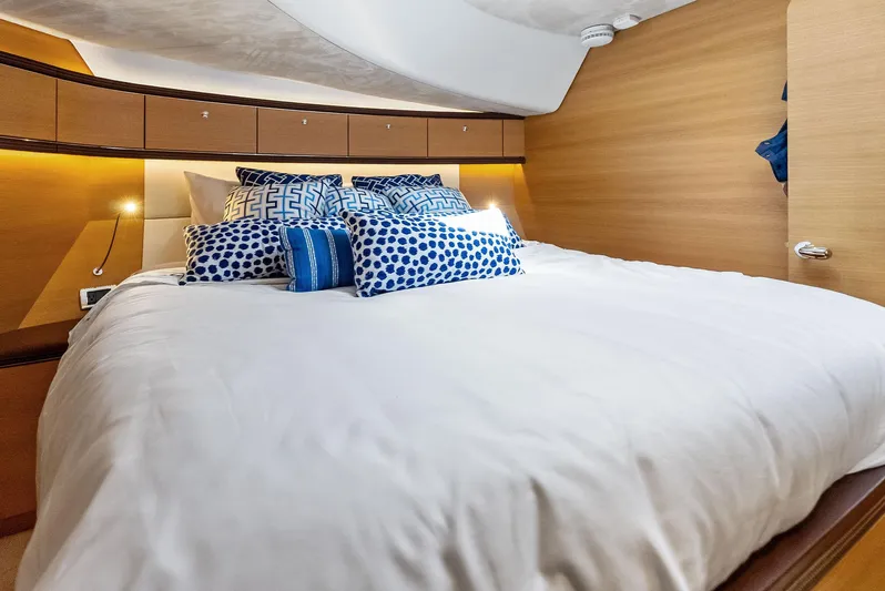 Dutch Yacht Photos Pics Luxurious bedroom interior of 2019 Zeelander 55 yacht with plush bedding and modern design.
