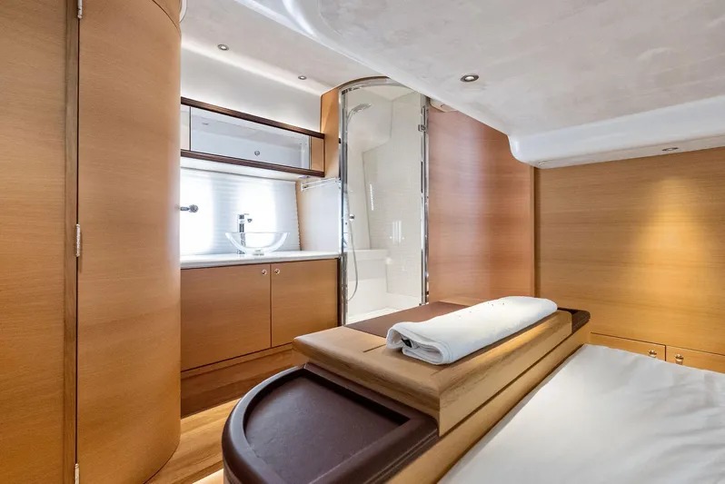 Dutch Yacht Photos Pics Luxurious interior of 2019 Zeelander 55 yacht with modern wood finishes and elegant bathroom.
