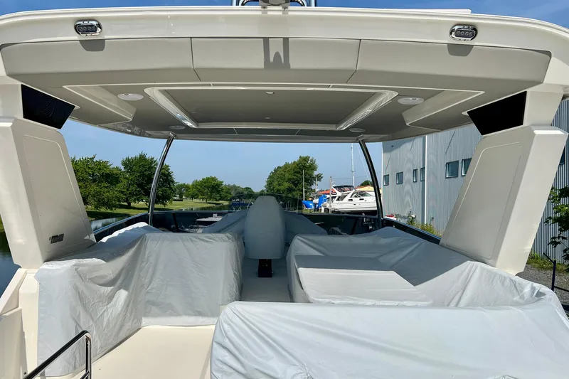  Yacht Photos Pics 2024 Absolute 58 Navetta yacht interior with covered seating and modern design.