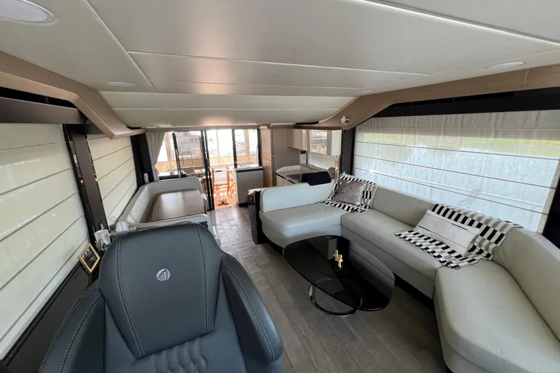  Yacht Photos Pics Luxurious interior of 2024 Absolute 58 Navetta yacht with modern seating and elegant decor.