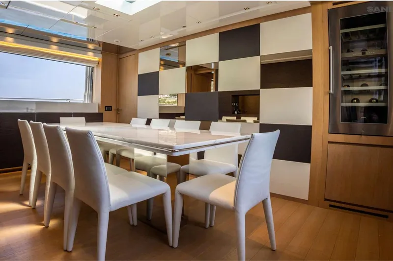 Aman - Sanlorenzo Sl96 Yacht Photos Pics Luxurious dining area on 2016 Sanlorenzo SL96 yacht with modern decor and elegant seating.