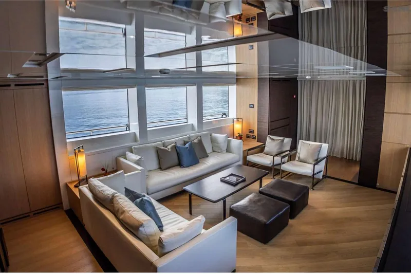 Aman - Sanlorenzo Sl96 Yacht Photos Pics Luxurious interior of 2016 Sanlorenzo SL96 yacht with elegant seating and ocean view.