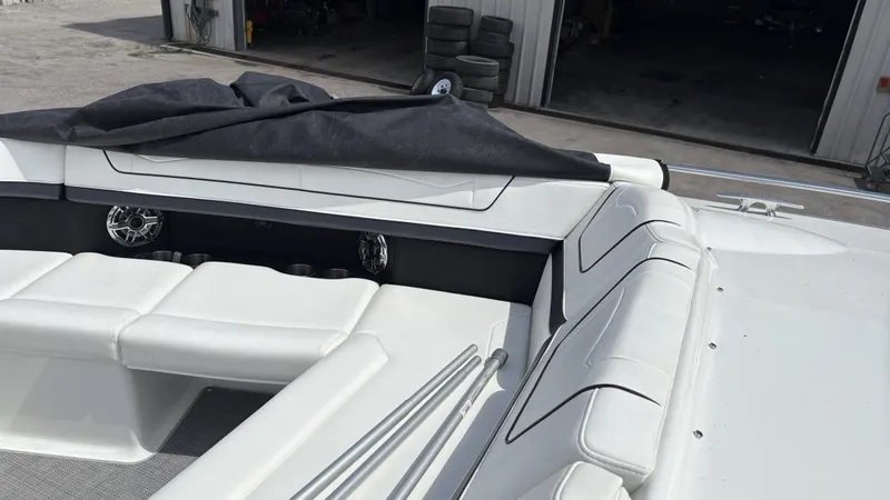  Yacht Photos Pics 2022 Formula 350 CBR boat interior with white seating and covered equipment.