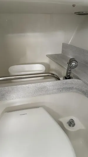  Yacht Photos Pics 2022 Formula 350 CBR boat bathroom with modern fixtures and sleek design.