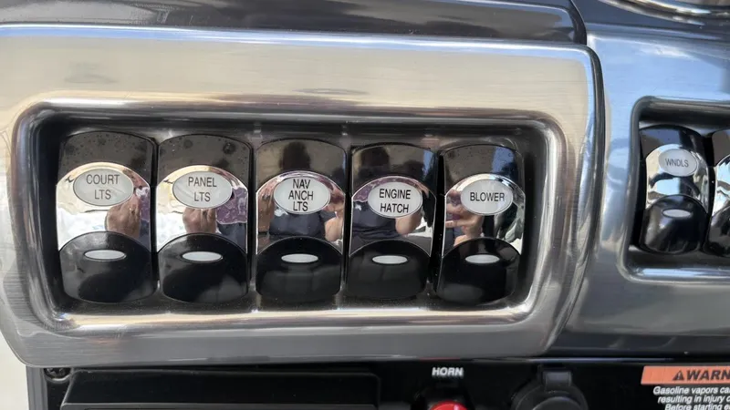  Yacht Photos Pics Control panel of a 2022 Formula 350 CBR boat with labeled switches.