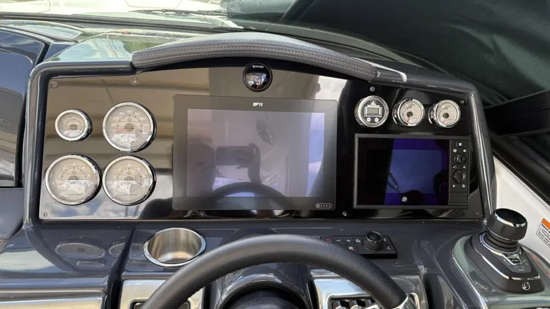  Yacht Photos Pics Dashboard of a 2022 Formula 350 CBR boat with gauges and digital displays.
