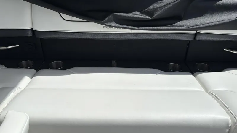  Yacht Photos Pics 2022 Formula 350 CBR boat interior with white seating and cup holders.