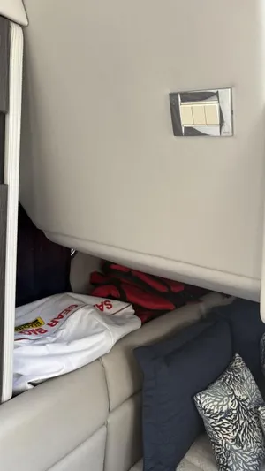  Yacht Photos Pics Interior of 2022 Formula 350 CBR boat with cushions and life jackets.