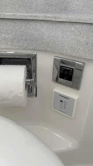  Yacht Photos Pics Toilet paper holder and Dometic control panel in 2022 Formula 350 CBR boat bathroom.