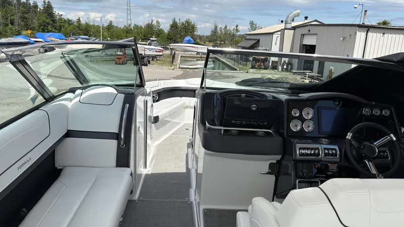  Yacht Photos Pics 2022 Formula 350 CBR boat interior with modern dashboard and seating.