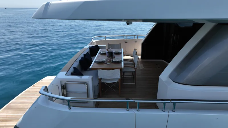 Aman - Sanlorenzo Sl96 Yacht Photos Pics Sanlorenzo SL96 2016 yacht deck with dining area overlooking the ocean.