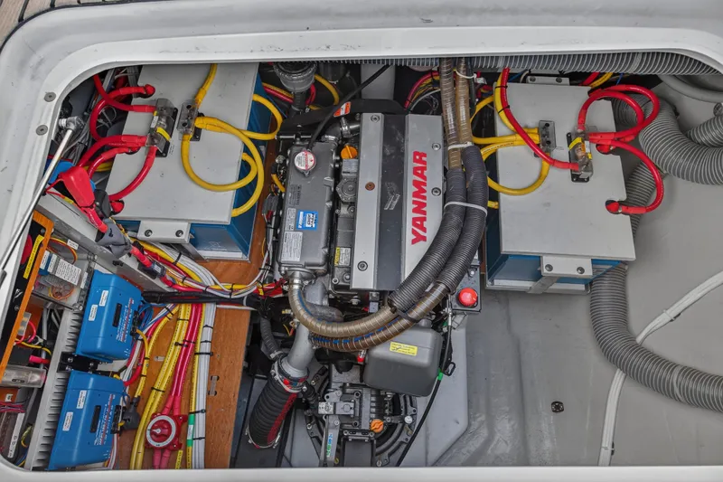 White Heron Yacht Photos Pics Engine compartment of 2021 Lagoon 46 Owner's Version with Yanmar engine and electrical components.