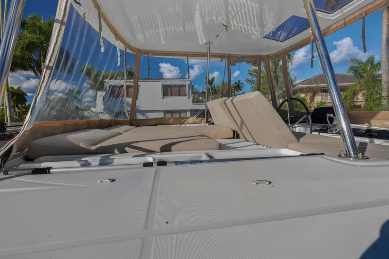 White Heron Yacht Photos Pics Lagoon 46 Owner's Version 2021 catamaran with spacious deck and clear canopy.