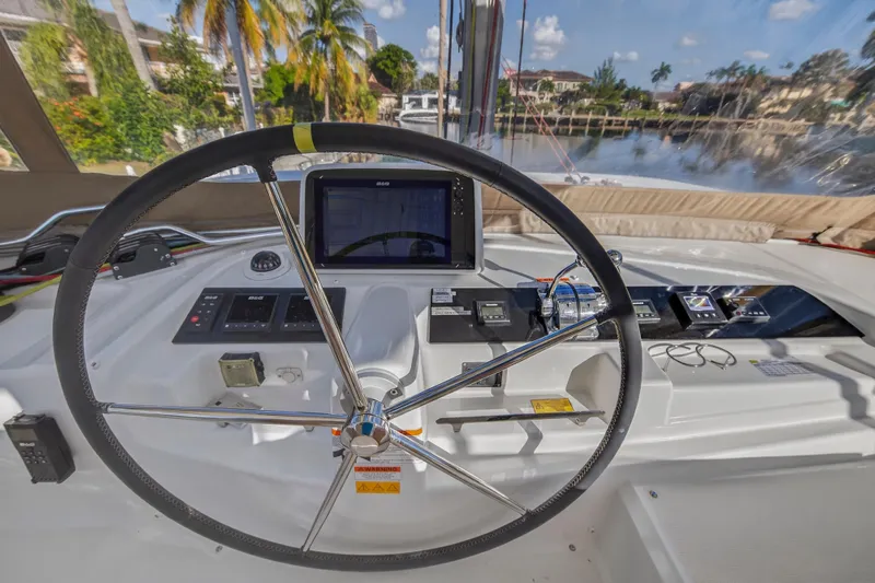 White Heron Yacht Photos Pics Steering wheel and controls of 2021 Lagoon 46 Owner's Version catamaran.