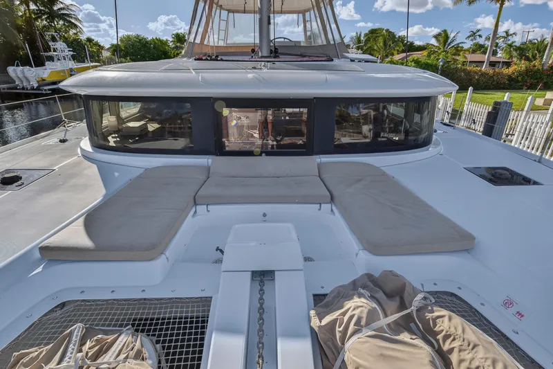 White Heron Yacht Photos Pics 2021 Lagoon 46 Owner's Version catamaran with spacious deck seating and modern design.