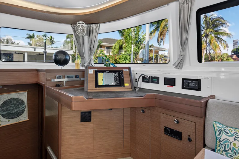 White Heron Yacht Photos Pics Interior of 2021 Lagoon 46 Owner's Version yacht with navigation equipment.