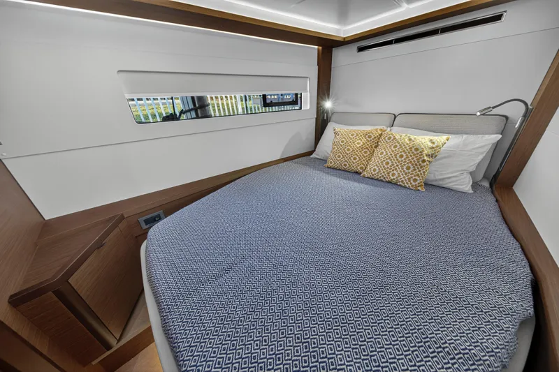 White Heron Yacht Photos Pics Luxurious bedroom in 2021 Lagoon 46 Owner's Version yacht with modern design.
