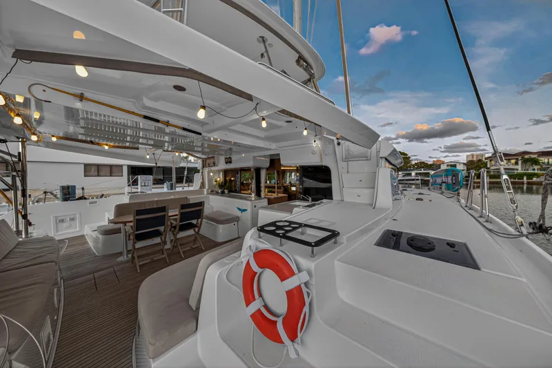 White Heron Yacht Photos Pics 2021 Lagoon 46 Owner's Version yacht with spacious deck and modern amenities.