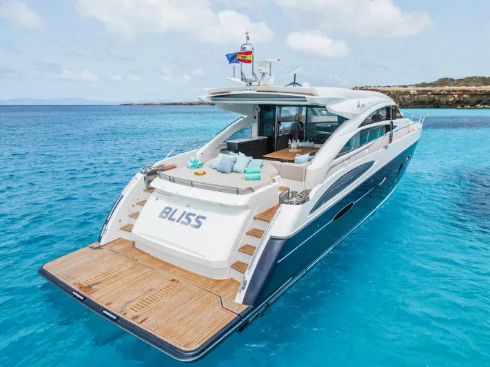  Yacht Photos Pics Luxurious 2016 Princess V72 yacht "Bliss" on clear blue water, featuring elegant design and spacious deck.