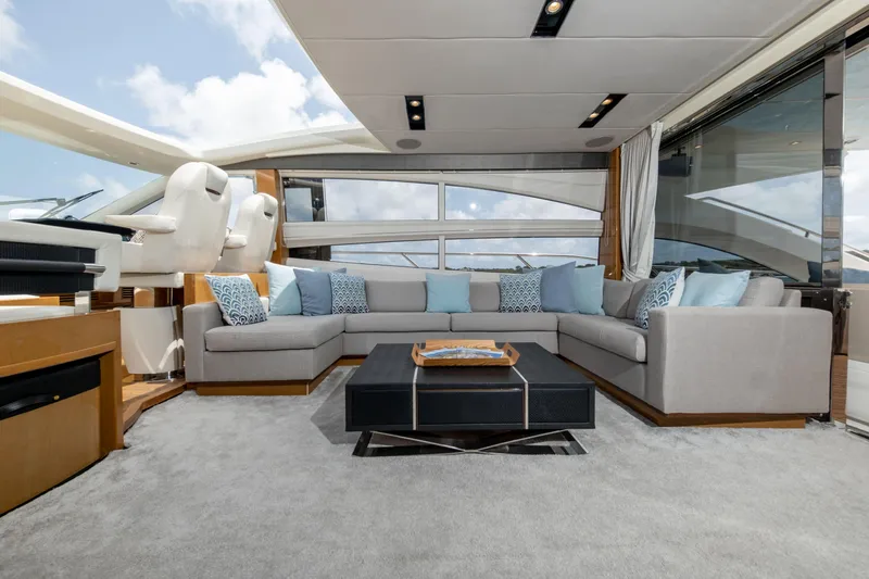 Yacht Photos Pics Luxurious interior of 2016 Princess V72 yacht with modern seating and elegant decor.