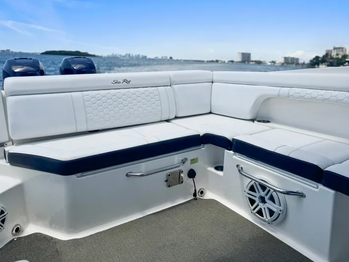  Yacht Photos Pics 2018 Sea Ray SDX 290 boat interior with white seating and ocean view.