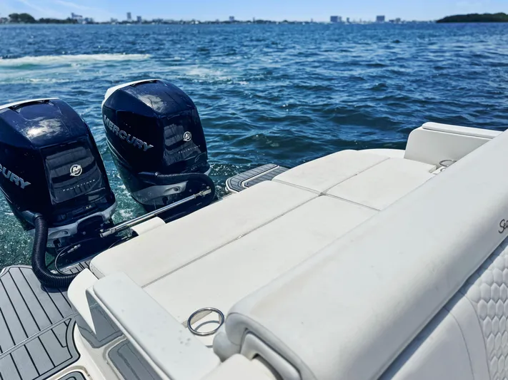  Yacht Photos Pics 2018 Sea Ray SDX 290 boat with twin Mercury engines on open water.