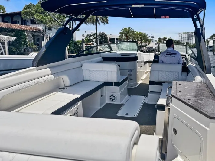  Yacht Photos Pics 2018 Sea Ray SDX 290 boat interior with spacious seating and modern design.