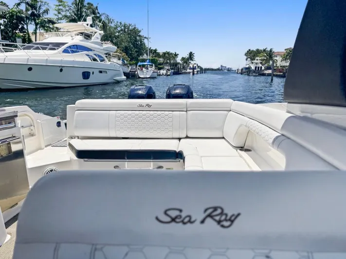  Yacht Photos Pics 2018 Sea Ray SDX 290 boat on a scenic waterway with luxury yachts.