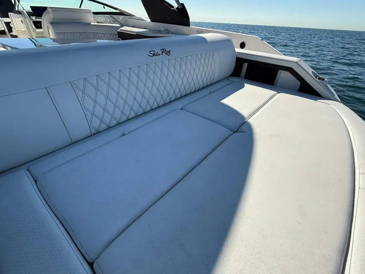  Yacht Photos Pics 2019 Sea Ray SLX 310 boat with luxurious white seating on open water.