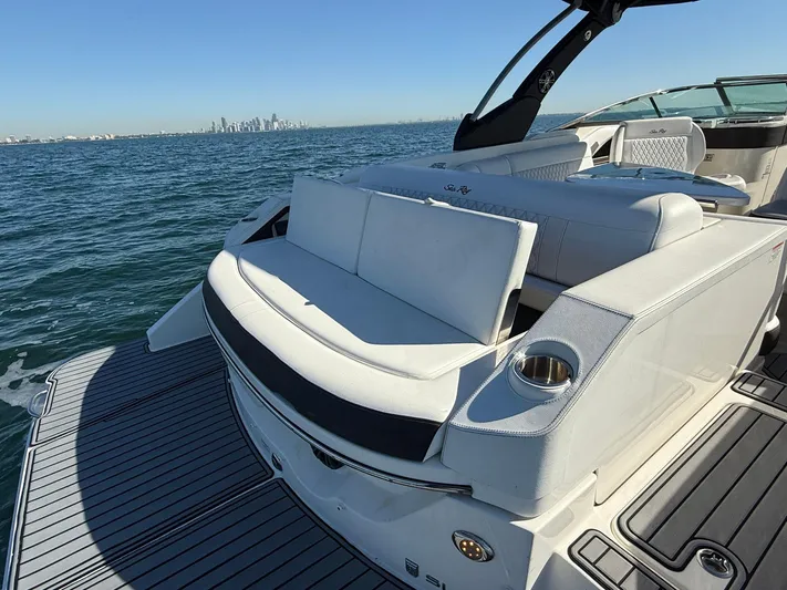  Yacht Photos Pics 2019 Sea Ray SLX 310 boat on water, featuring luxurious seating and sleek design.