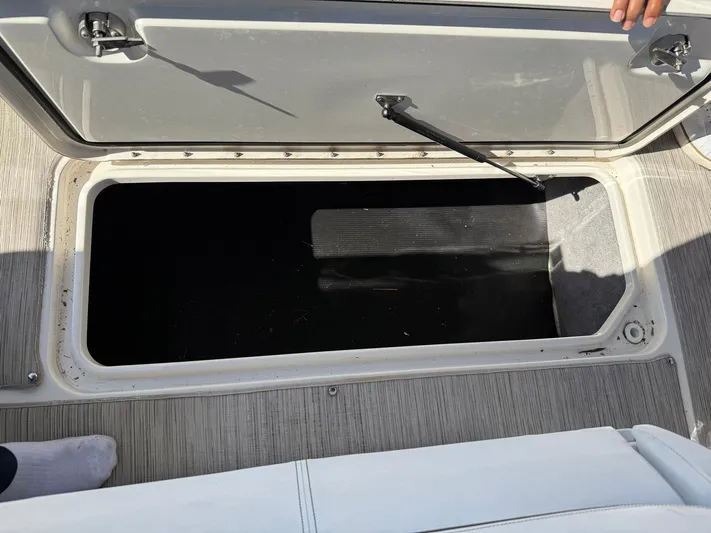  Yacht Photos Pics Open storage compartment on 2019 Sea Ray SLX 310 boat deck.