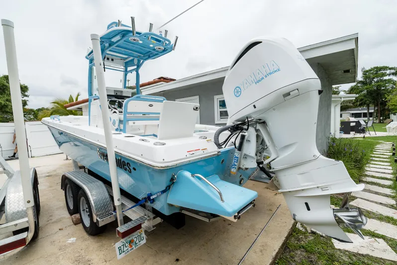 Yacht Photos Pics 2021 Everglades 243 Center Console boat on trailer with Yamaha outboard motor.