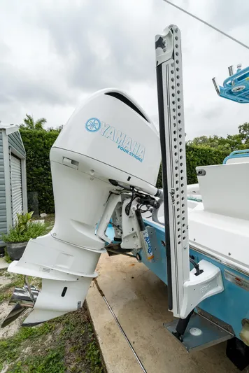  Yacht Photos Pics 2021 Everglades 243 Center Console boat with Yamaha outboard motor, docked outdoors.