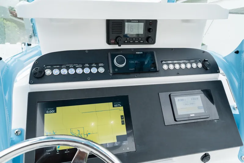  Yacht Photos Pics 2021 Everglades 243 Center Console dashboard with navigation and control systems.